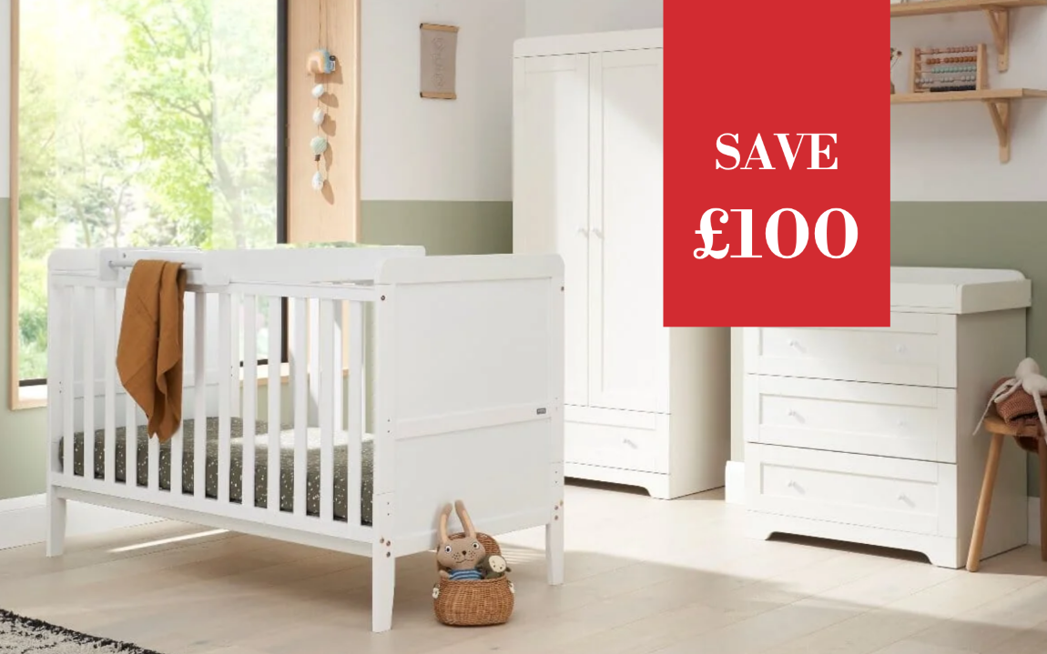 A white wooden baby crib with a brown blanket draped over the side, shown in a styled nursery alongside a white wardrobe and changing unit. A red promotional overlay on the right reads 'SAVE £100'.