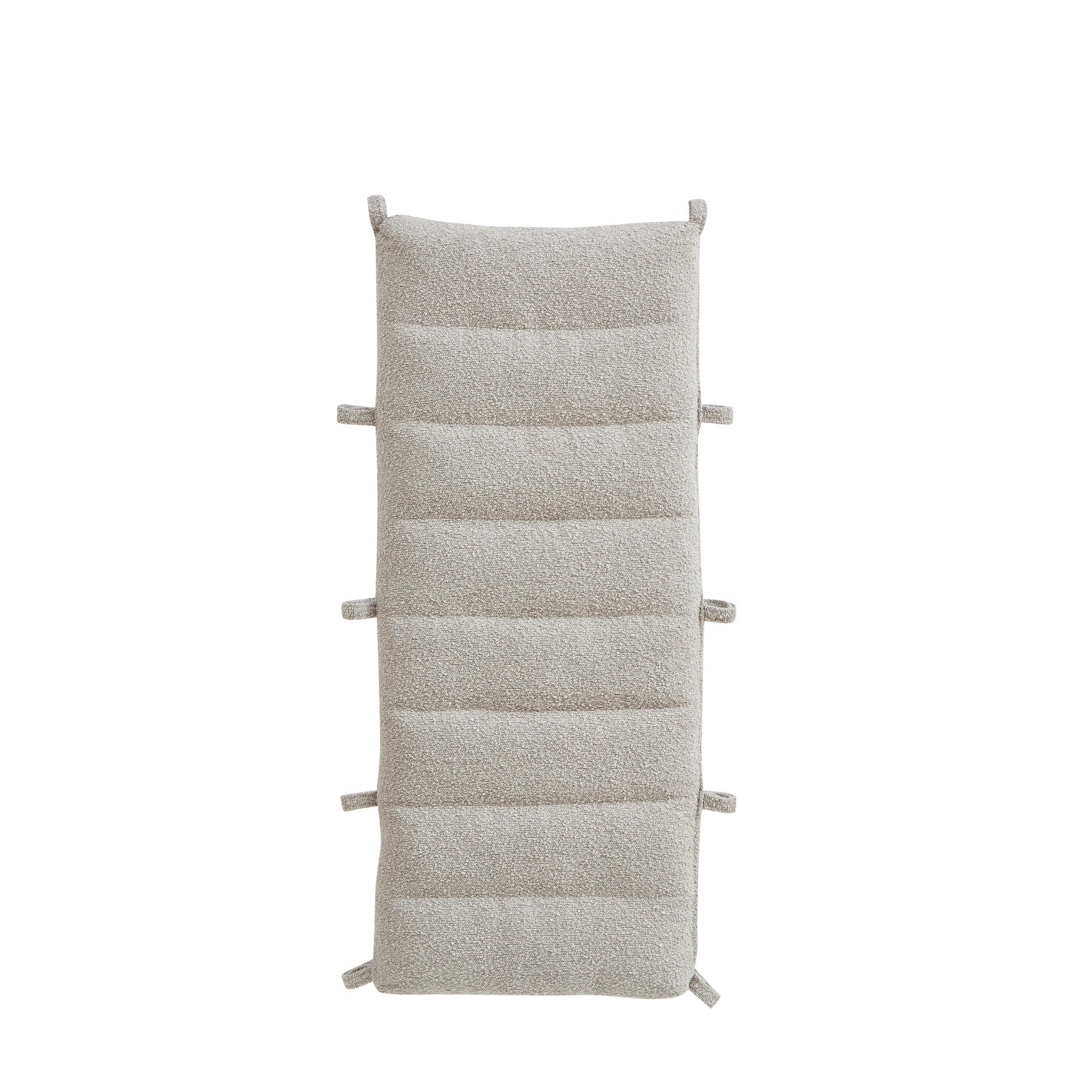 Cutout of the Scala Montessori Pikler Cushion in Boucle Mushroom with looped edges for easy attachment to the rocking frame