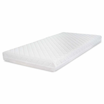 Angled view of sprung nursery mattress with quilted white cover and supportive foam-filled design for comfortable baby sleep.