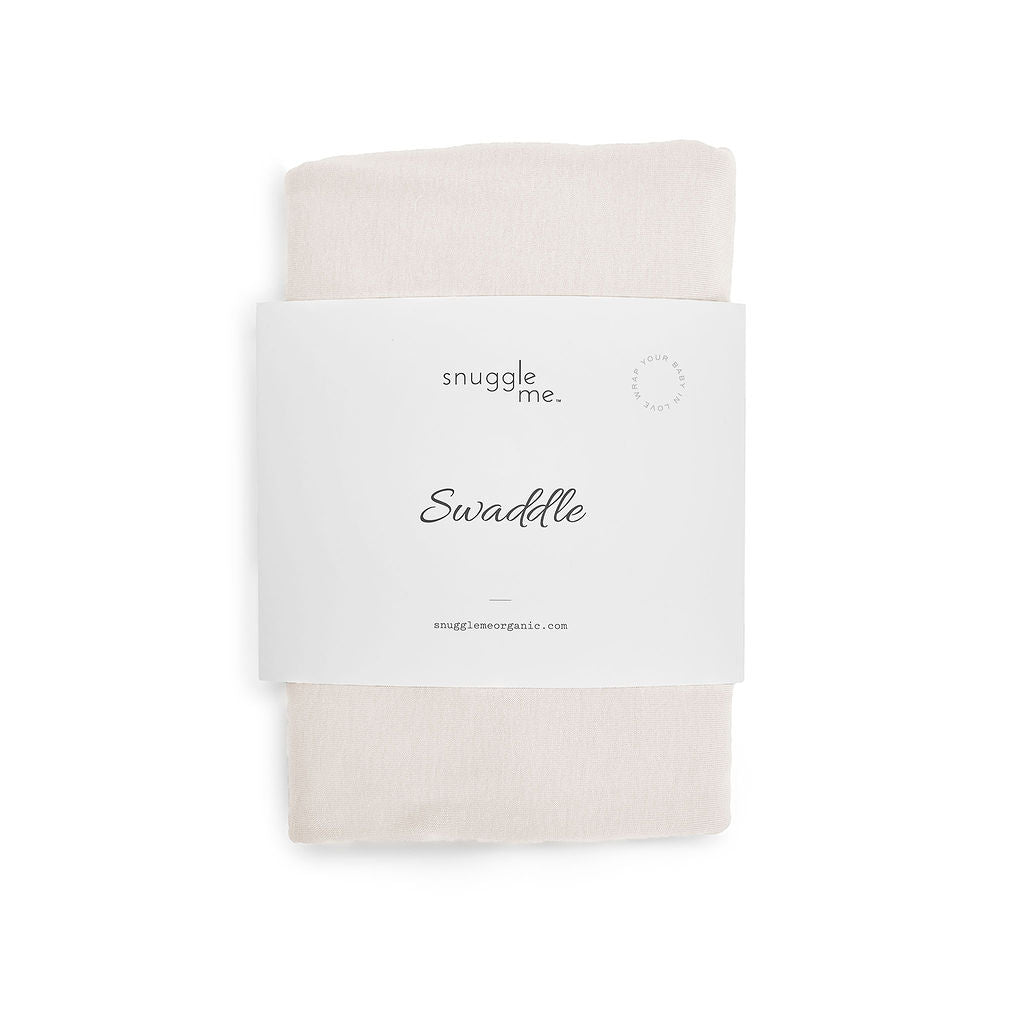 Snuggle Me swaddle blanket with packaging on a white background