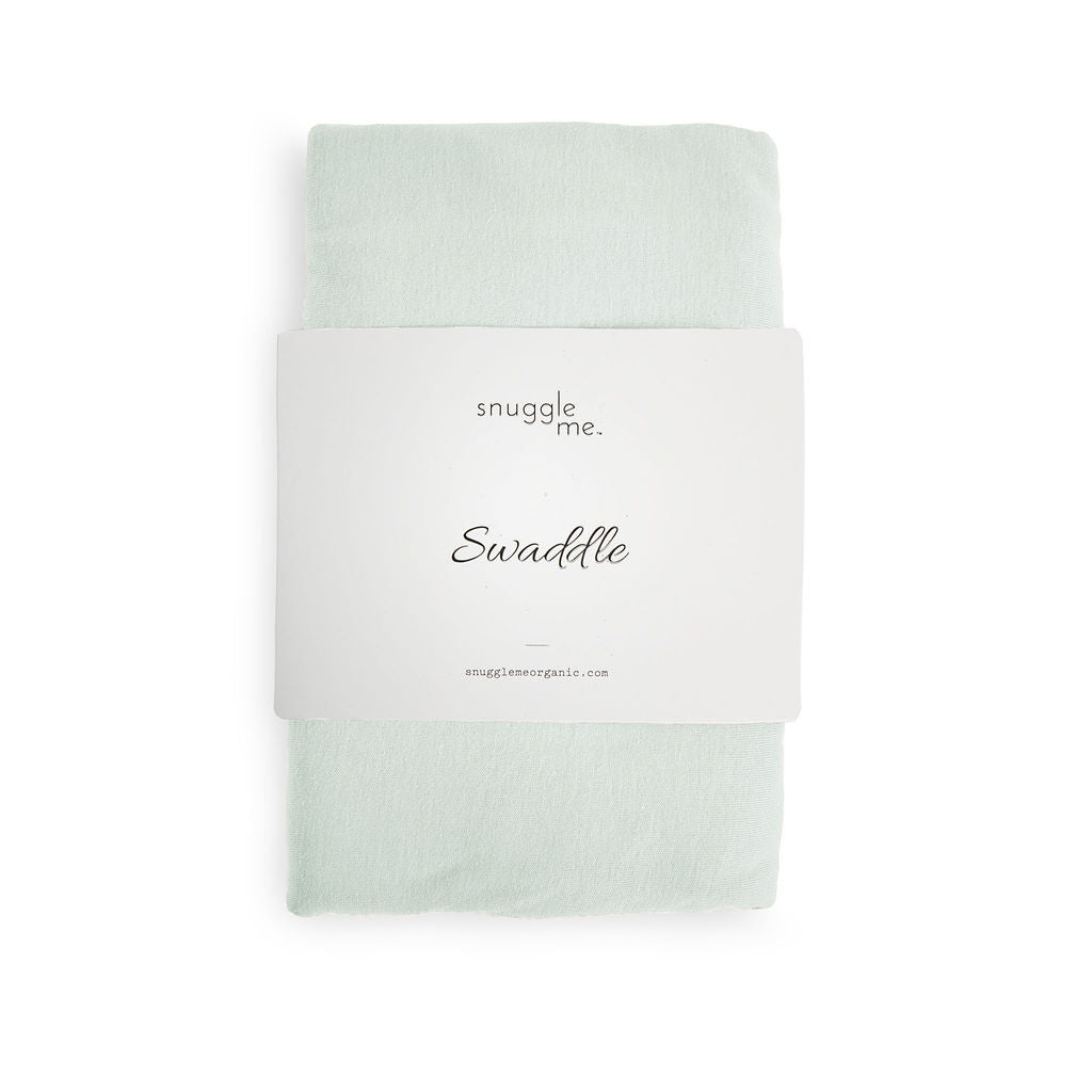 Light green swaddle blanket with 'snuggle me' branding on a white background