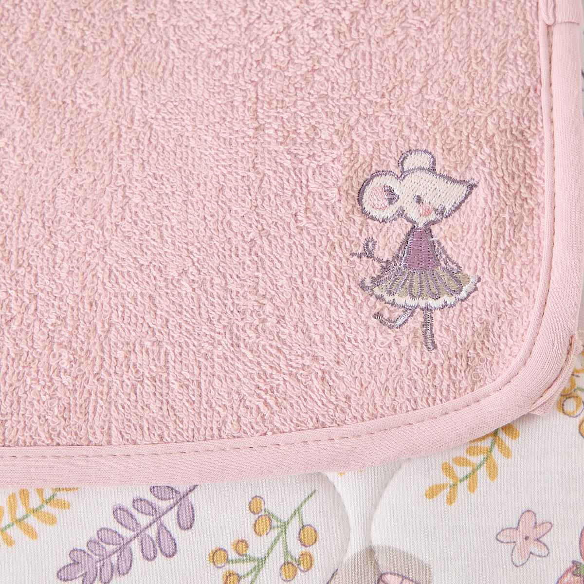 Pink towel with embroidered mouse design and floral border