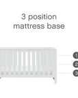 Front view of the Tivoli cot bed in white showing the three-position mattress base, designed to adjust as your baby grows
