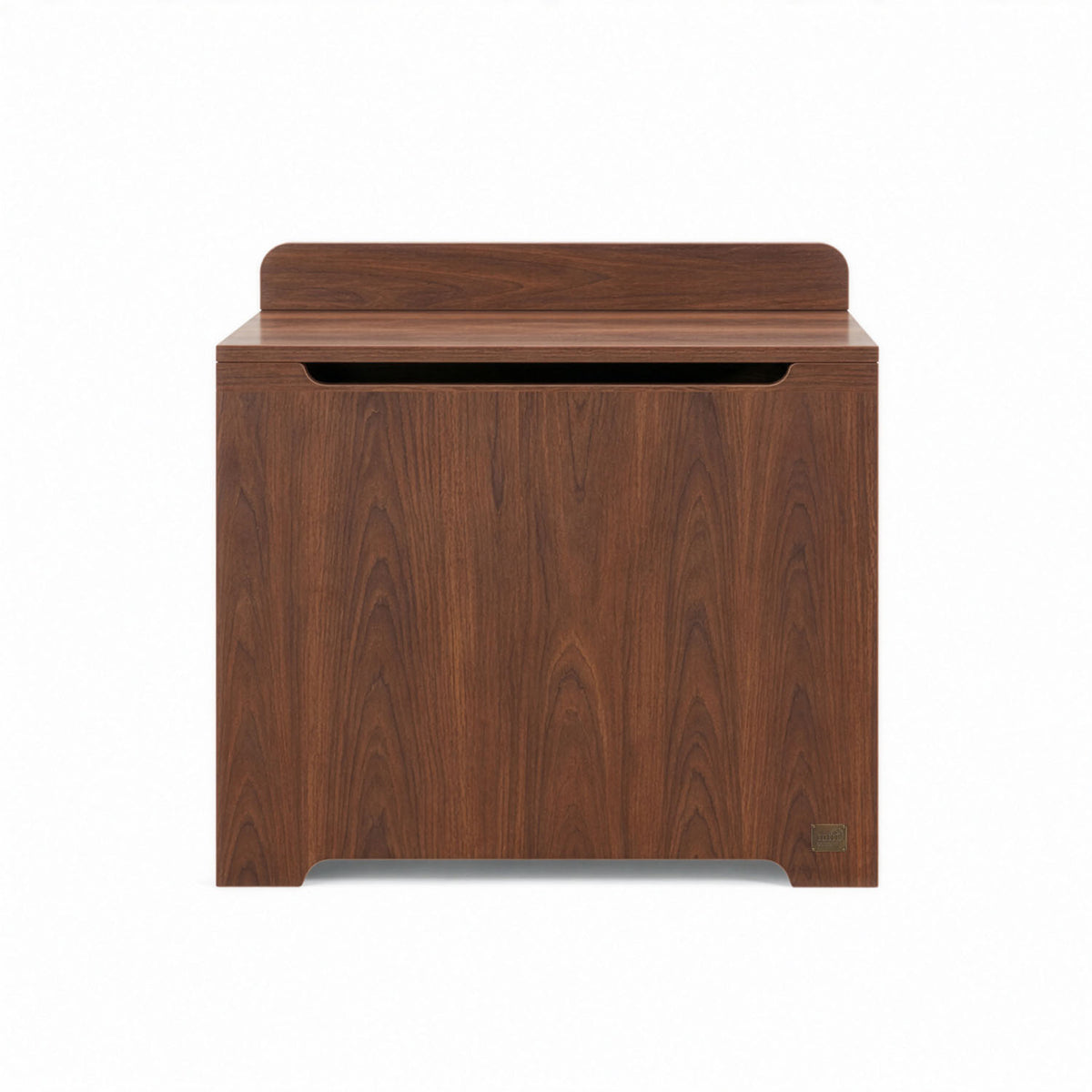 Origin toy box in walnut designed with rounded edges and a gap-front opening to minimize pinch points and maximize child safety.