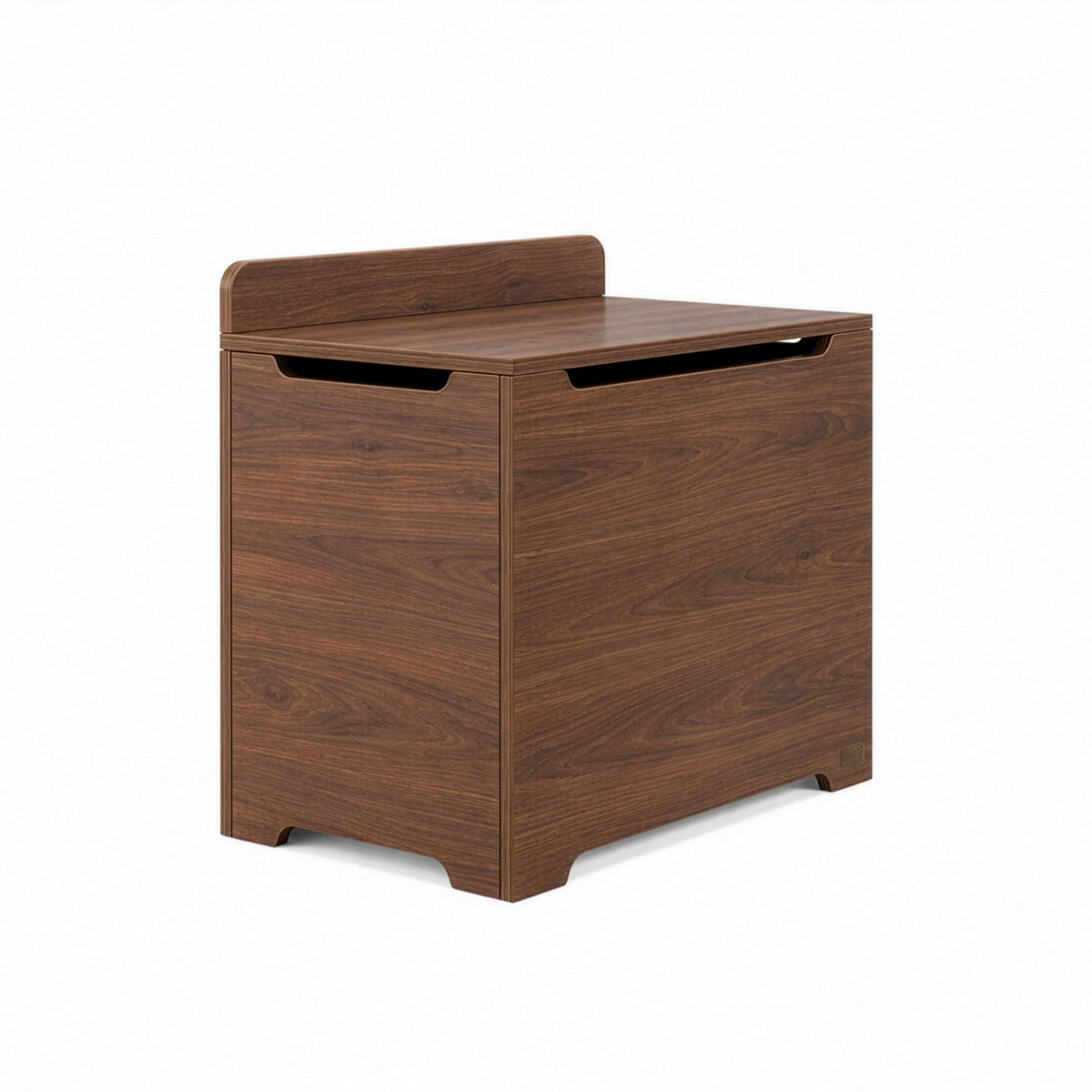 An angle view of the Origin toy box in walnut designed with rounded edges and a gap-front opening to minimize pinch points and maximize child safety.