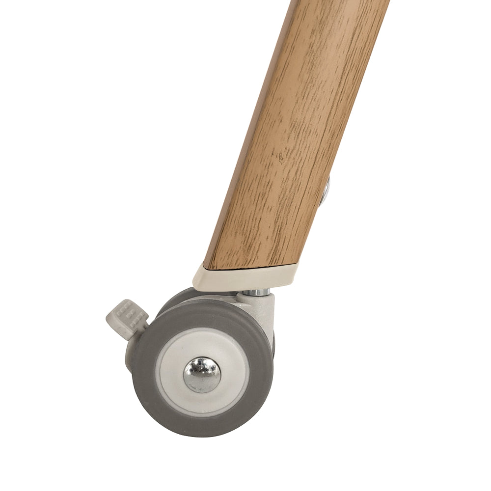 Tutti Bambini CoZee Air in Scandinavian Walnut and Ecru – Lockable castor wheels for smooth mobility and secure placement