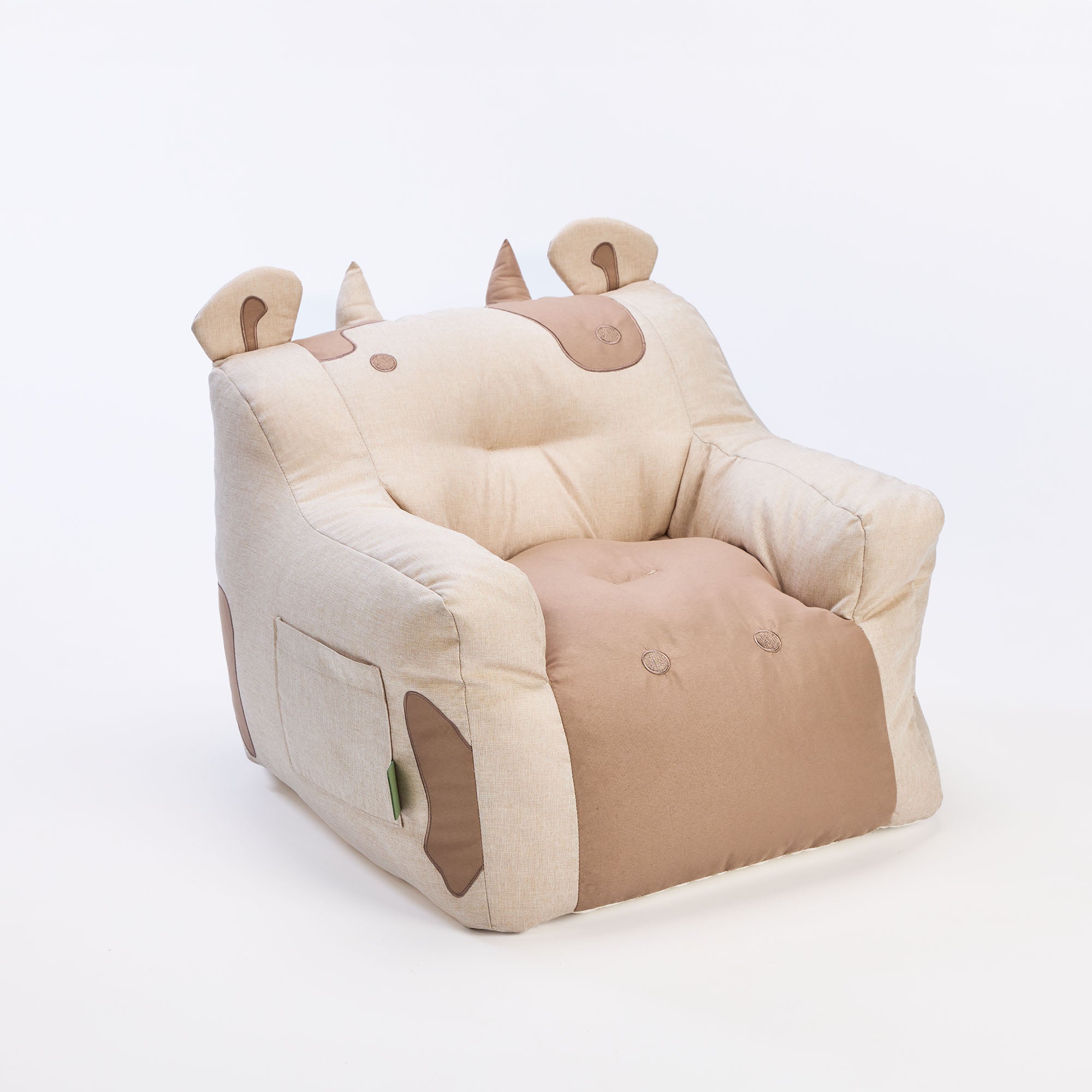 Angled cutout of the Clemi Cow beanbag chair showing sculpted seat shape and stitched character details