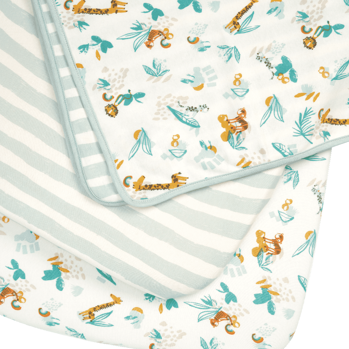 close up of fitted sheets and coverlet from the run wild bedside crib bundle featuring playful jungle motifs