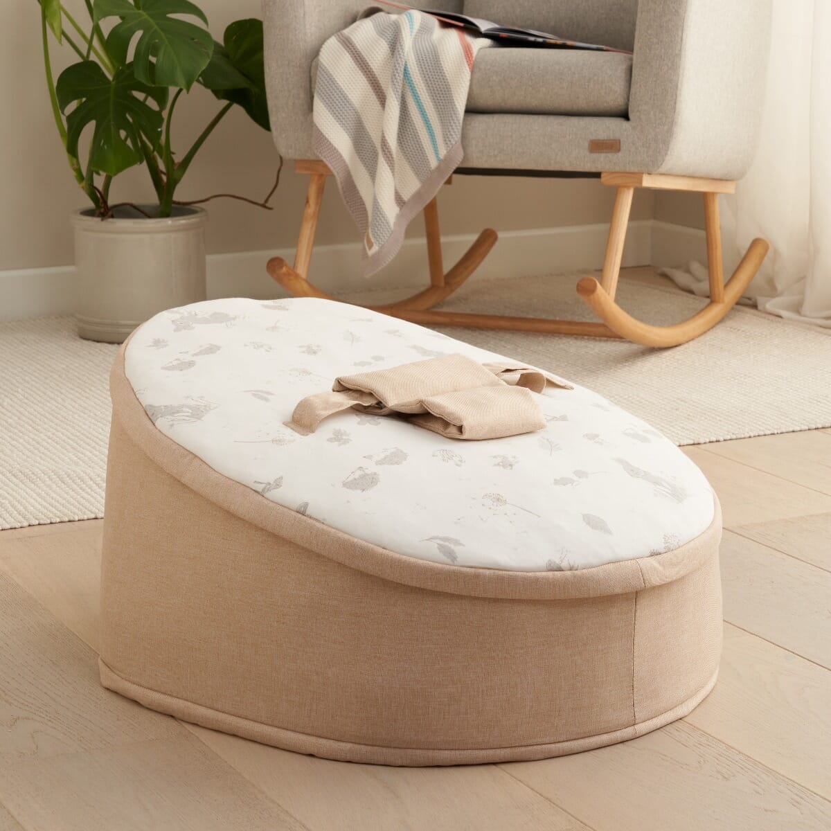 Cocoon baby bean bag styled in a nursery space, offering a cosy, supportive place for baby to relax during supervised rest time