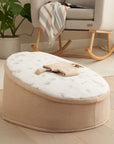 Cocoon baby bean bag styled in a nursery space, offering a cosy, supportive place for baby to relax during supervised rest time
