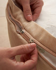 Close-up of the concealed zip on the Cocoon baby bean bag, allowing easy removal of the cover for cleaning and everyday care