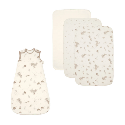 Cocoon bedside crib bundle with woodland print sleep bag and two organic cotton fitted sheets, designed for cosy, safe sleep