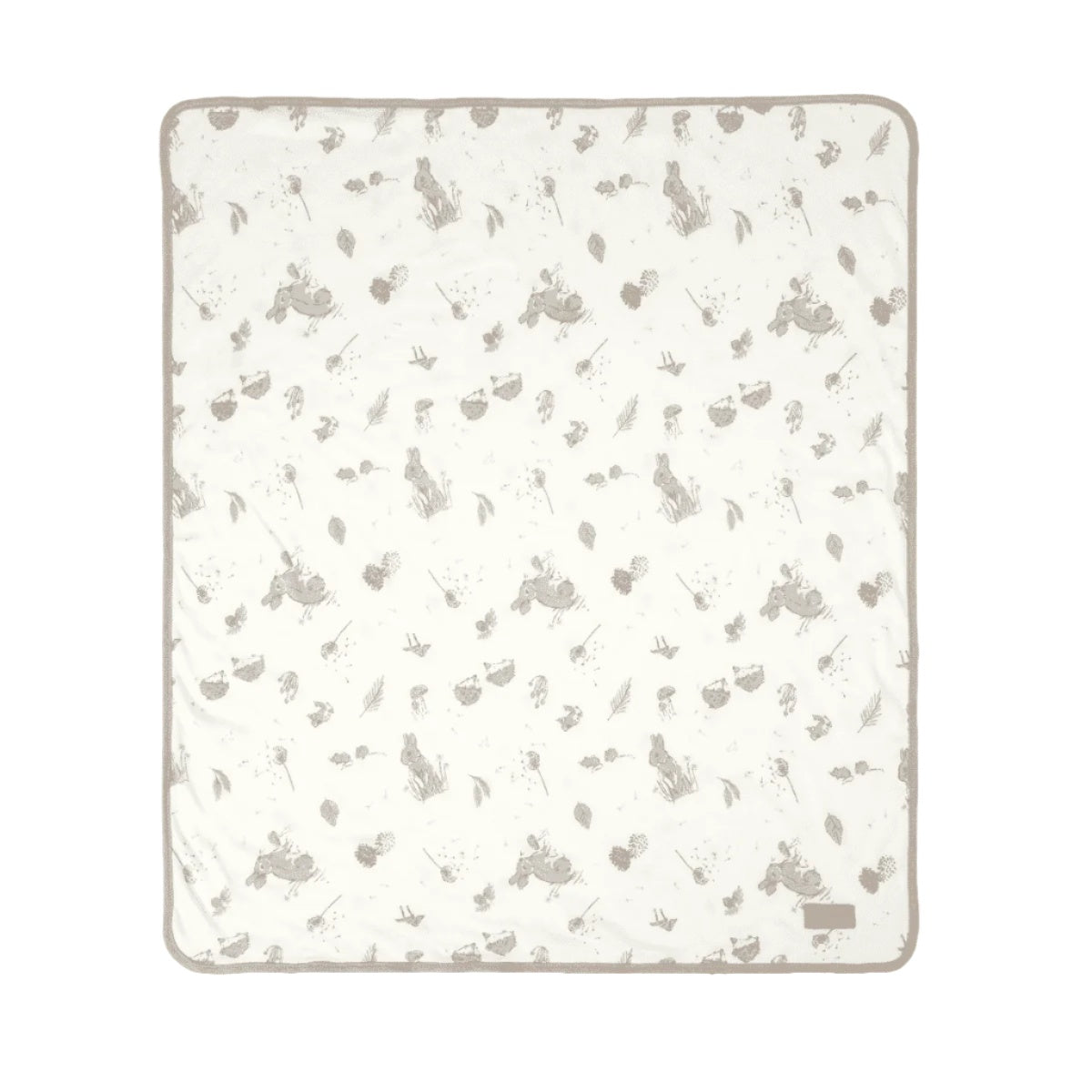 Open lay cutout of Cocoon coverlet, quilted organic cotton with woodland animal prints and soft grey trim for warmth and comfort