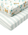 Pack of two cot bed fitted sheets from the Run Wild collection, including one striped and one safari animal print, crafted from soft organic cotton