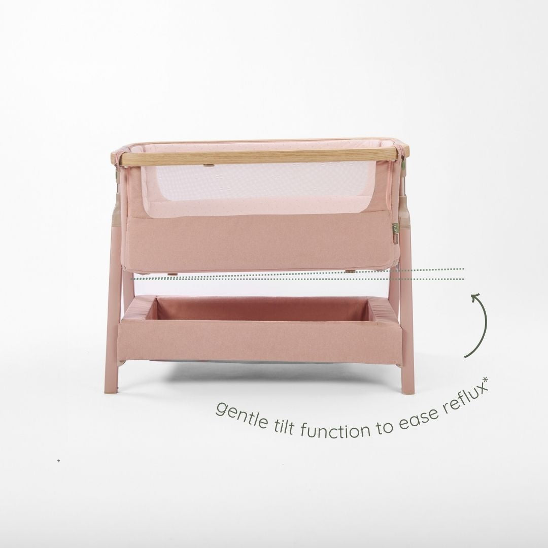 CoZee Air 2 bedside crib in toasted oak and sand featuring 6-step height adjustment for easy bedside positioning.