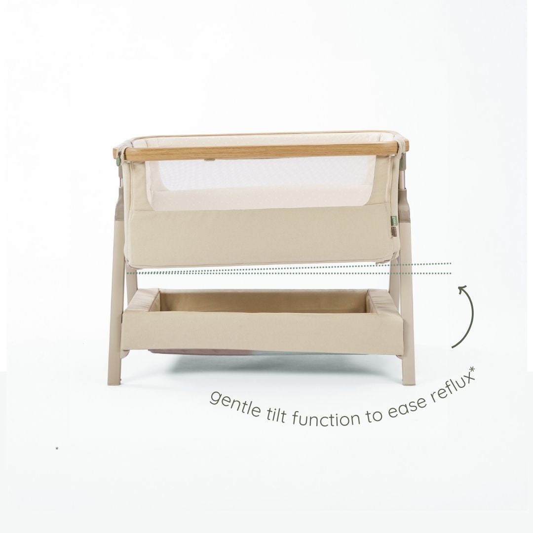 CoZee Air 2 bedside crib in toasted oak and sand showing gentle incline setting to help ease reflux.