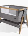 Angled cutout of CoZee Air in Oak and Charcoal – shows soft charcoal fabrics, mesh sides, and integrated rocking legs