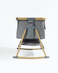 Side view of CoZee Air in Oak and Charcoal – breathable mesh, drop-side function, and curved rocking legs.