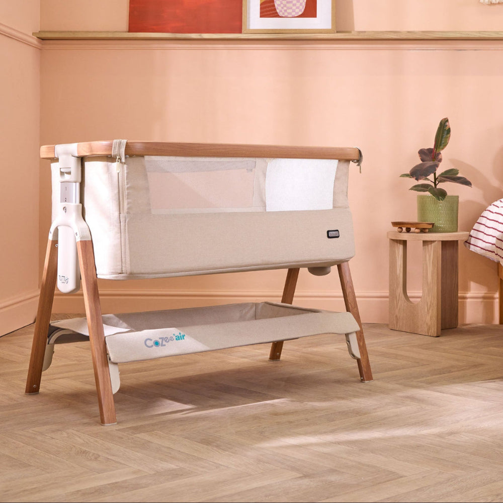 CoZee Air Bedside Crib in Scandinavian and Ecru – stylish bedroom setup with mesh panel and oak-effect frame