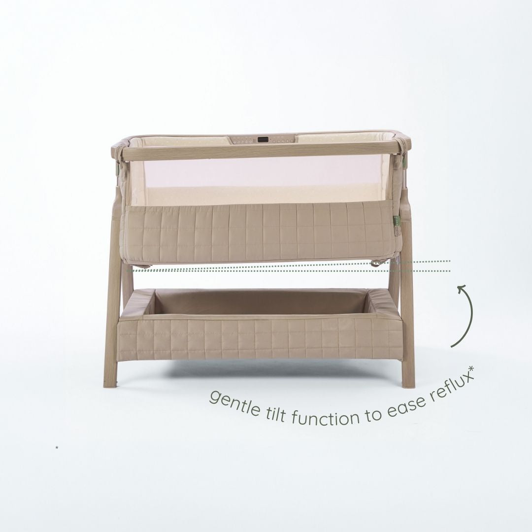 CoZee Sense bedside crib in soft walnut and cocoa demonstrating gentle incline setting to help ease reflux.