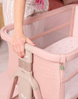 lifestyle showing the height adjustability of the cozee zen in blush 