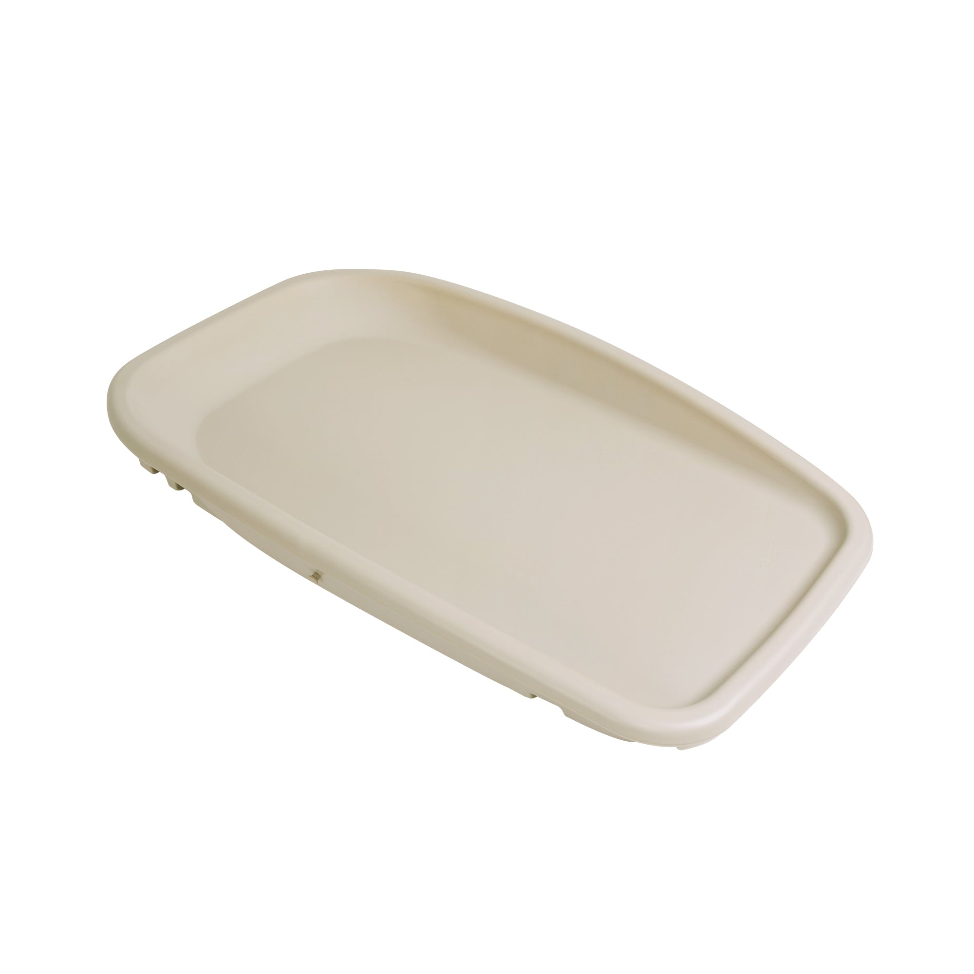 Angled cutout of the Cushi Baby Changing Mat in cashmere, showing contoured edges and wipe-clean surface for easy nappy changes