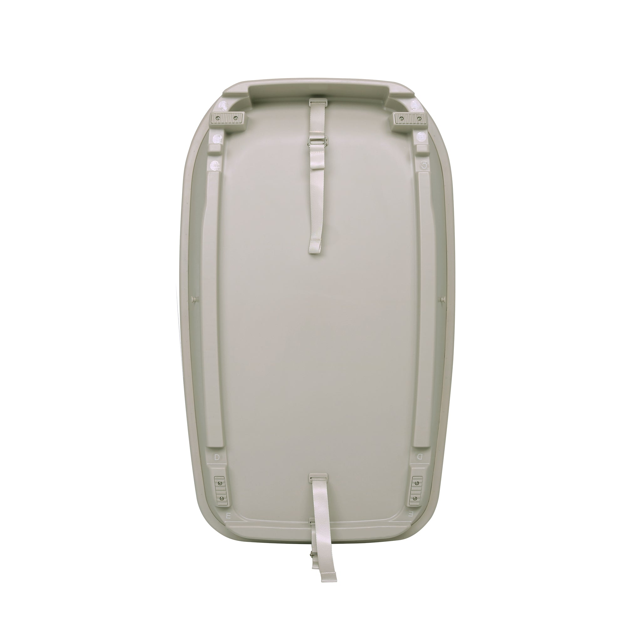 Rear view of the Cushi baby changing mat in mushroom finish, showing secure safety straps for cot attachment