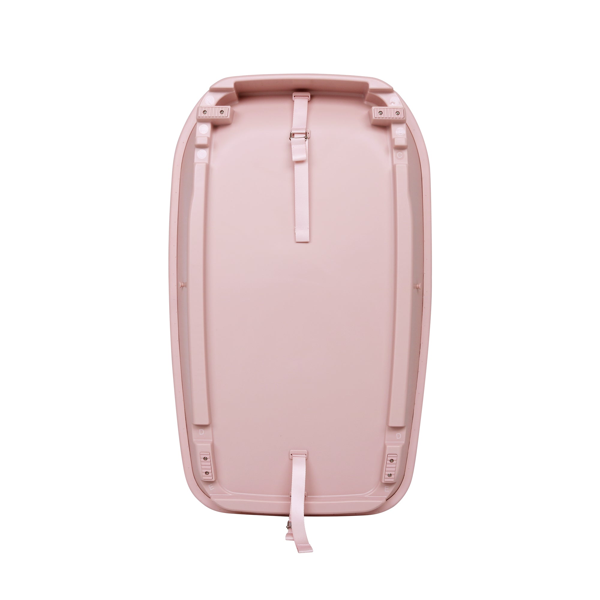 Back cutout of the Cushi baby changing mat in petal pink, showing safety straps and secure fixing points for cot top use