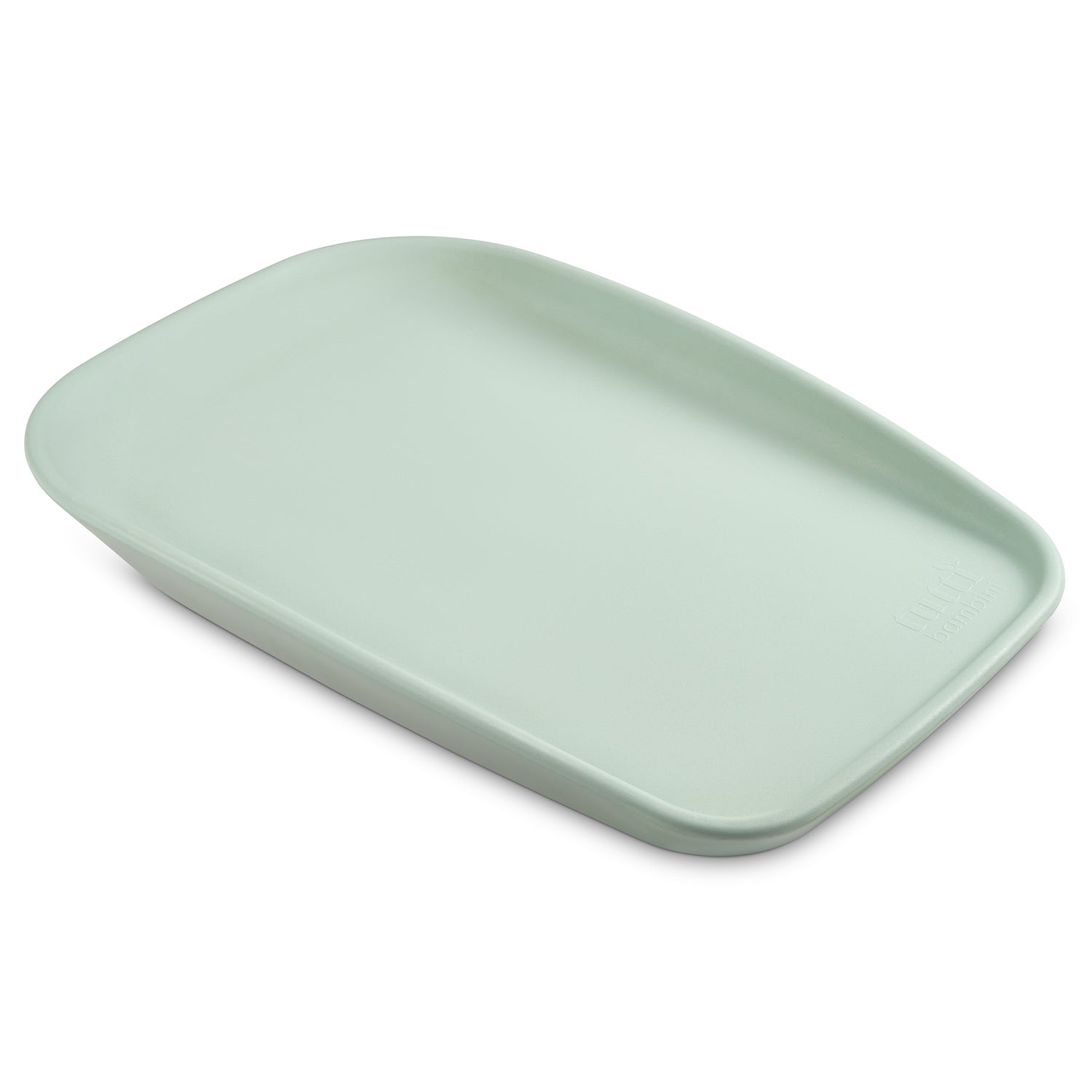 Angled view of the Cushi mini baby changing mat in leaf, highlighting the ergonomic form, wipe-clean surface and compact profile.