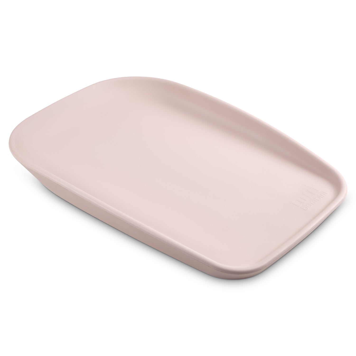 Angled view of the Cushi Mini baby changing mat in petal, highlighting the slim profile, raised edges and wipe-clean surface.