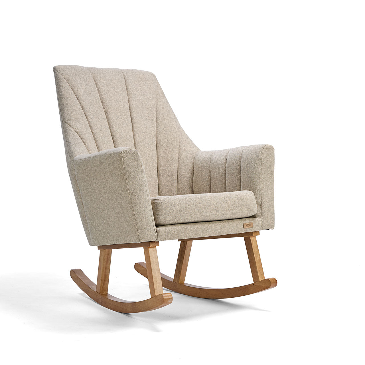 Angled cutout of the Danica rocking chair in stone, highlighting curved silhouette, soft padding, and smooth wooden rocking base
