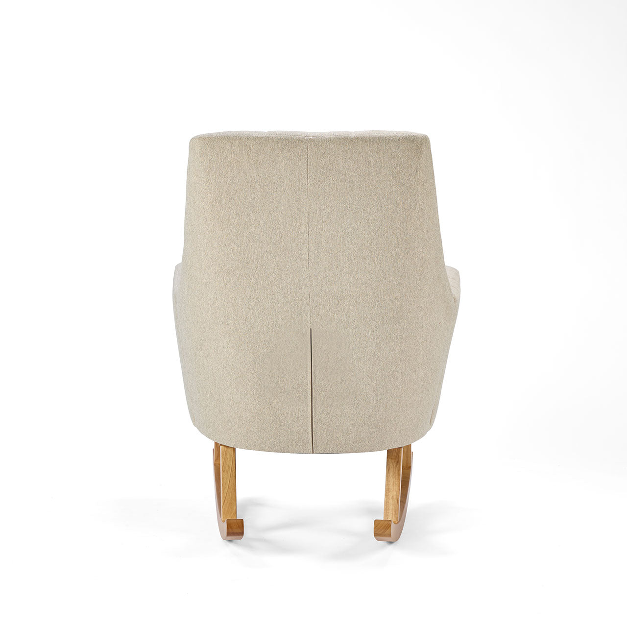 Back view of the Danica rocking chair in stone, showing smooth upholstered finish and elegant oak legs for a refined nursery look