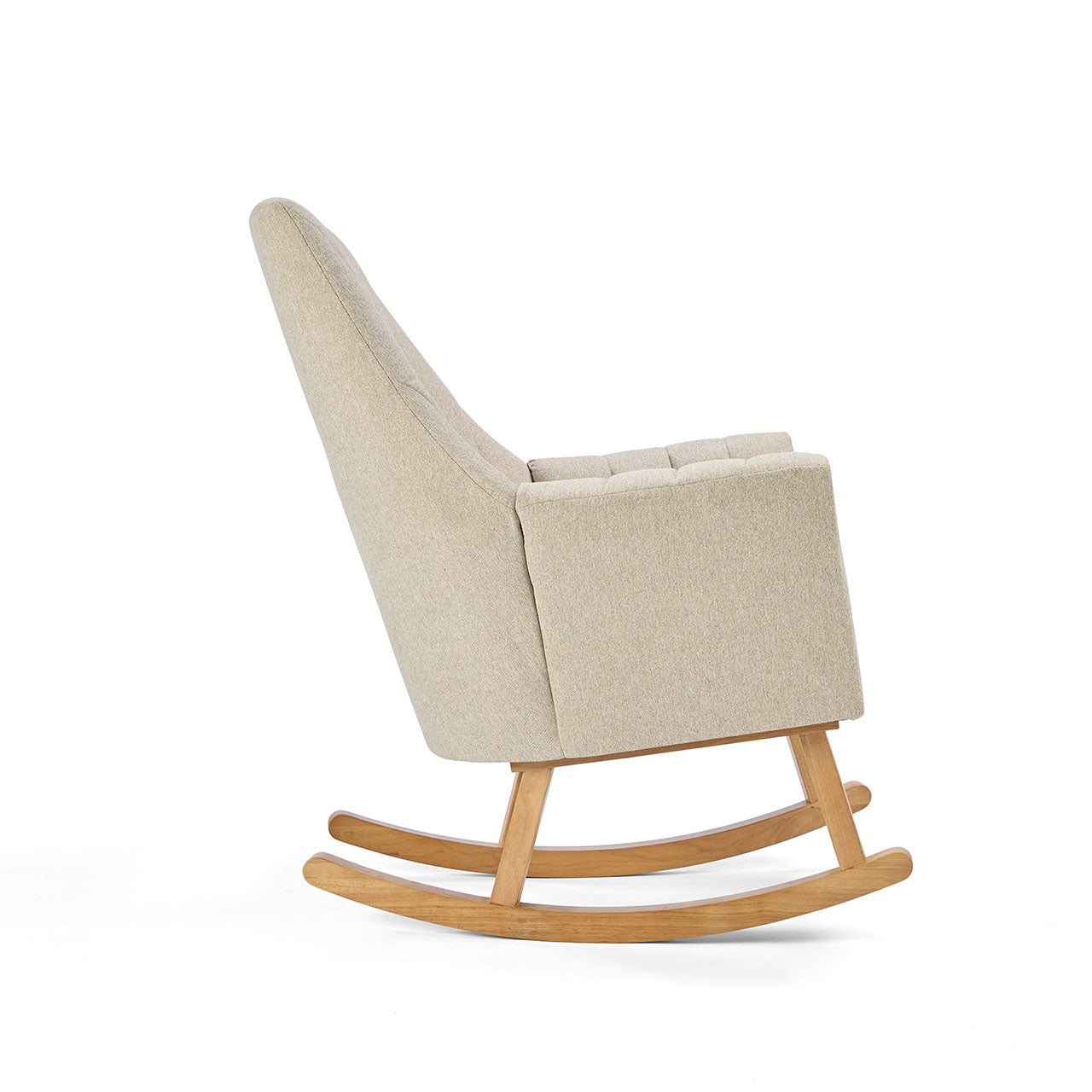 Side profile of the Danica rocking chair in stone, featuring high backrest, contoured arms, and a natural wood rocking frame
