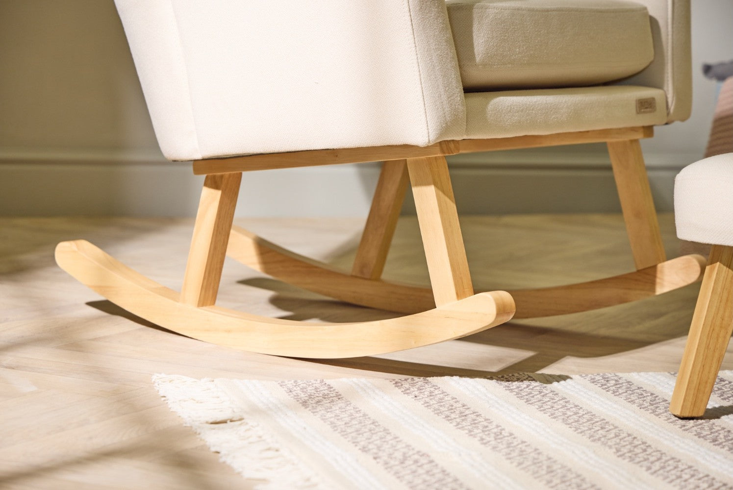 danica rocking chair featuring a rocking bar to easily rock your little one to sleep