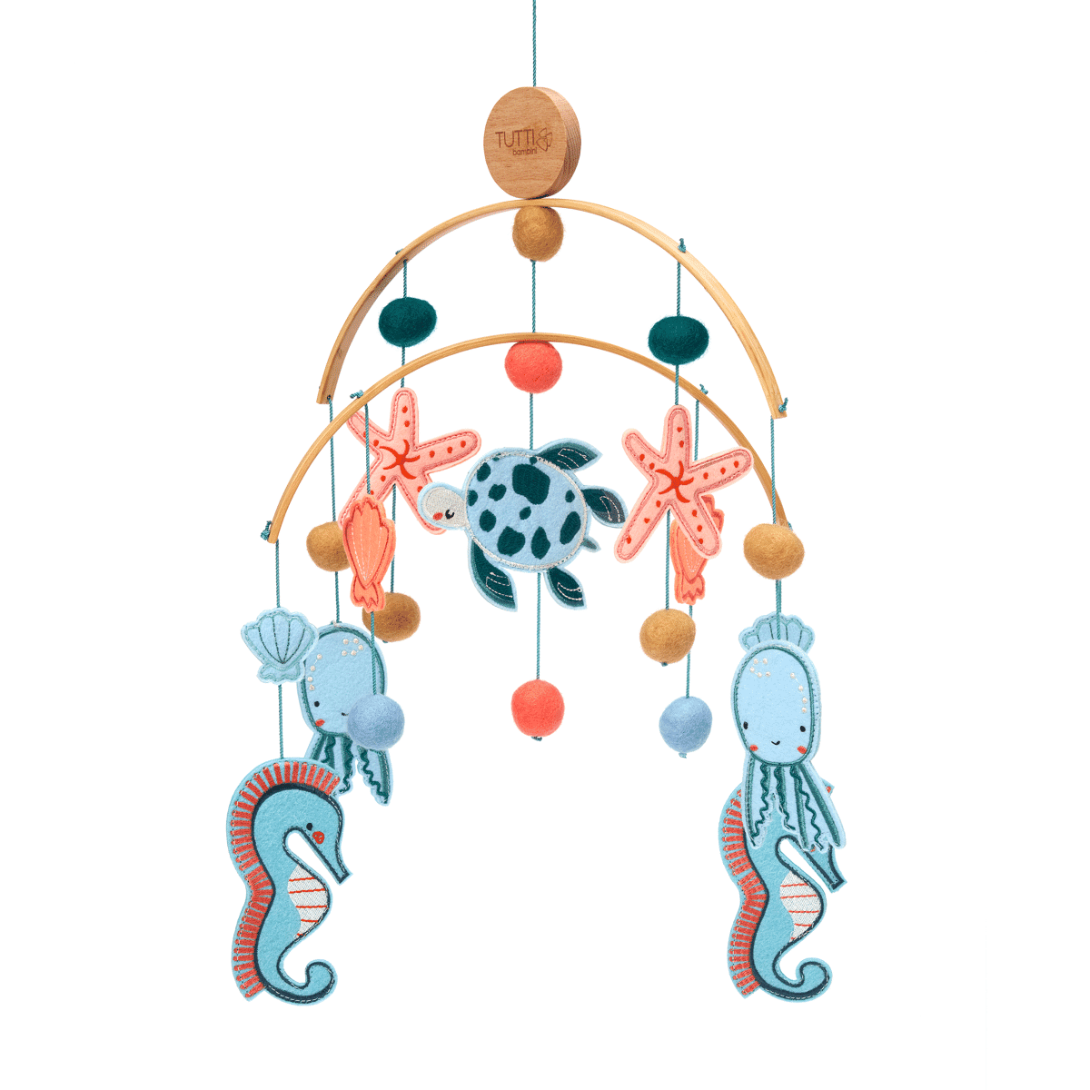 Cutout view of the Our Planet felt nursery mobile with sea animals, soft felt shapes and wooden arches, designed to gently move above baby