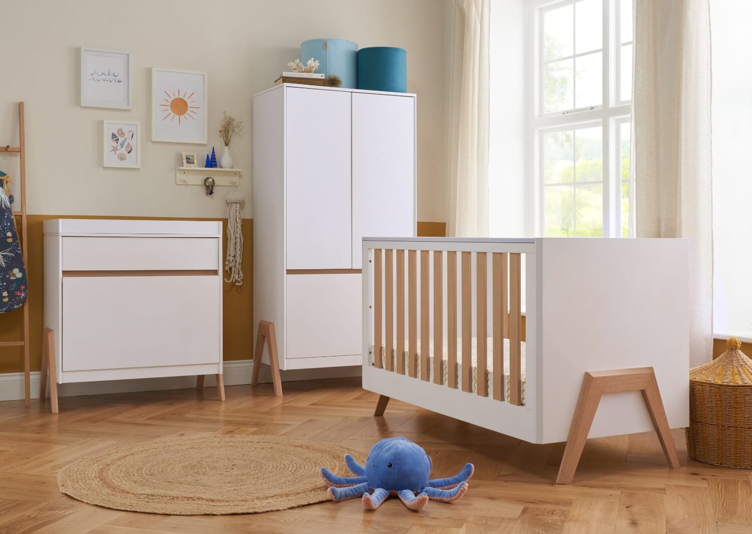 Fuori 3-piece nursery room set in white and light oak, featuring cot bed, chest changer and wardrobe styled together for a cohesive look