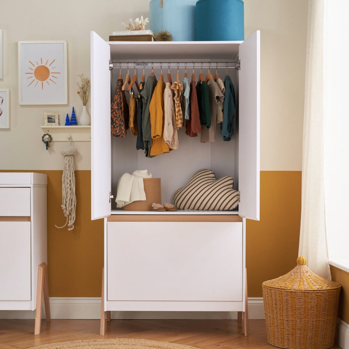 fuori wardrobe white light oak open doors view showing hanging rail and spacious storage for all your nursery essentials. 