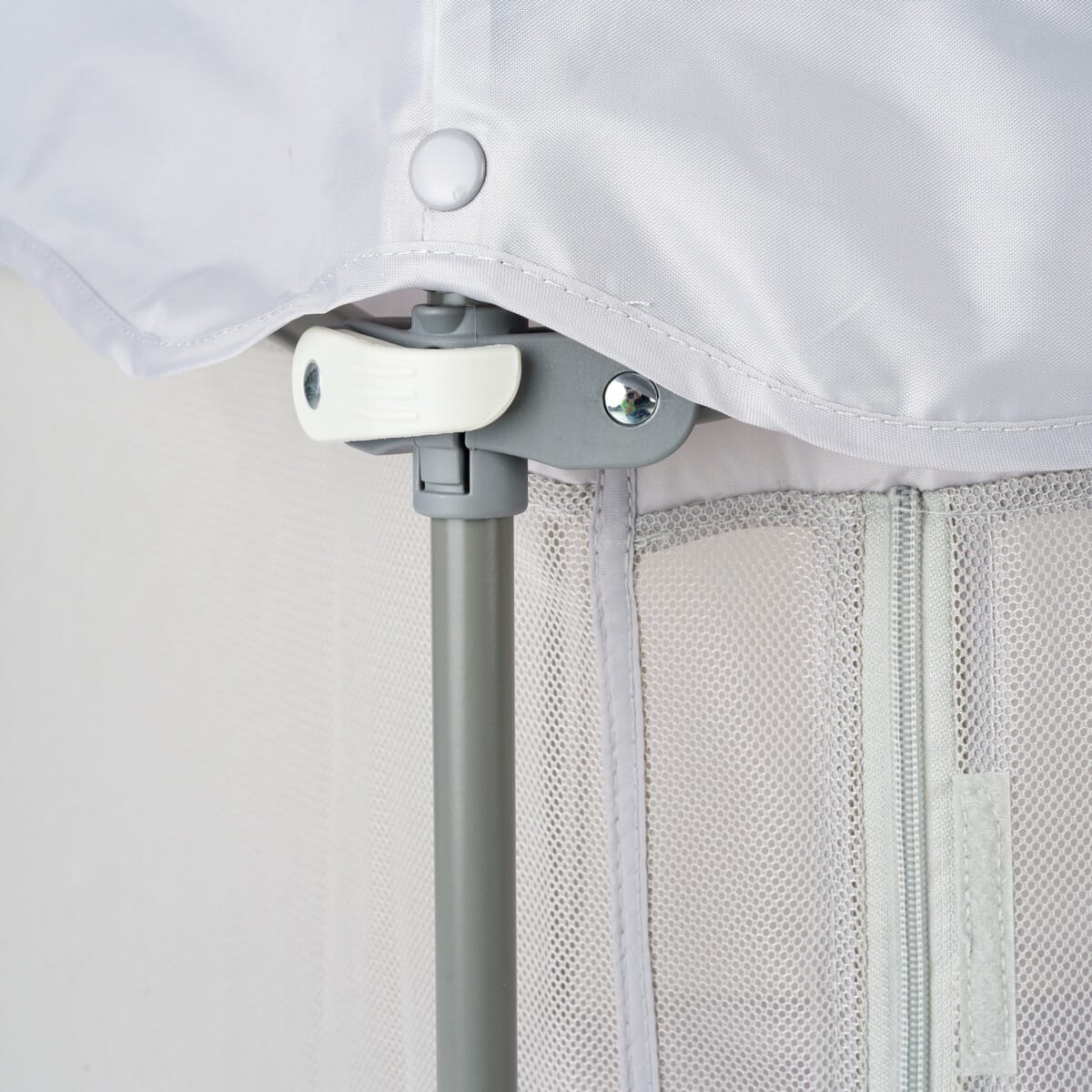 Close-up of the Hexa Playpen in Grey, showing secure closing mechanism 