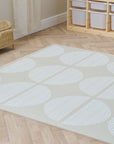 Infinity playmat Orbital Oatmeal on a neutral playroom.