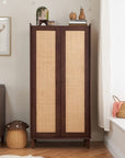 Japandi wardrobe in warm walnut with closed doors, showcasing woven rattan panels and clean lines for a stylish, contemporary nursery look.