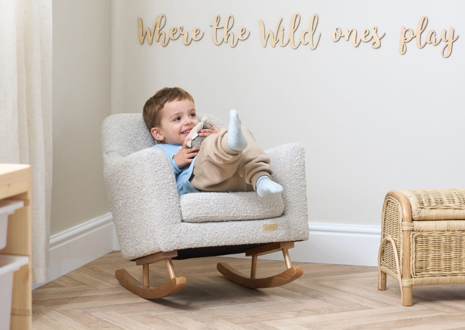 Jonah Mini Me Children's Rocking Chair in Boucle Mushroom - lifestyle image 1 featuring the mini rocking chair and the kid playing in it