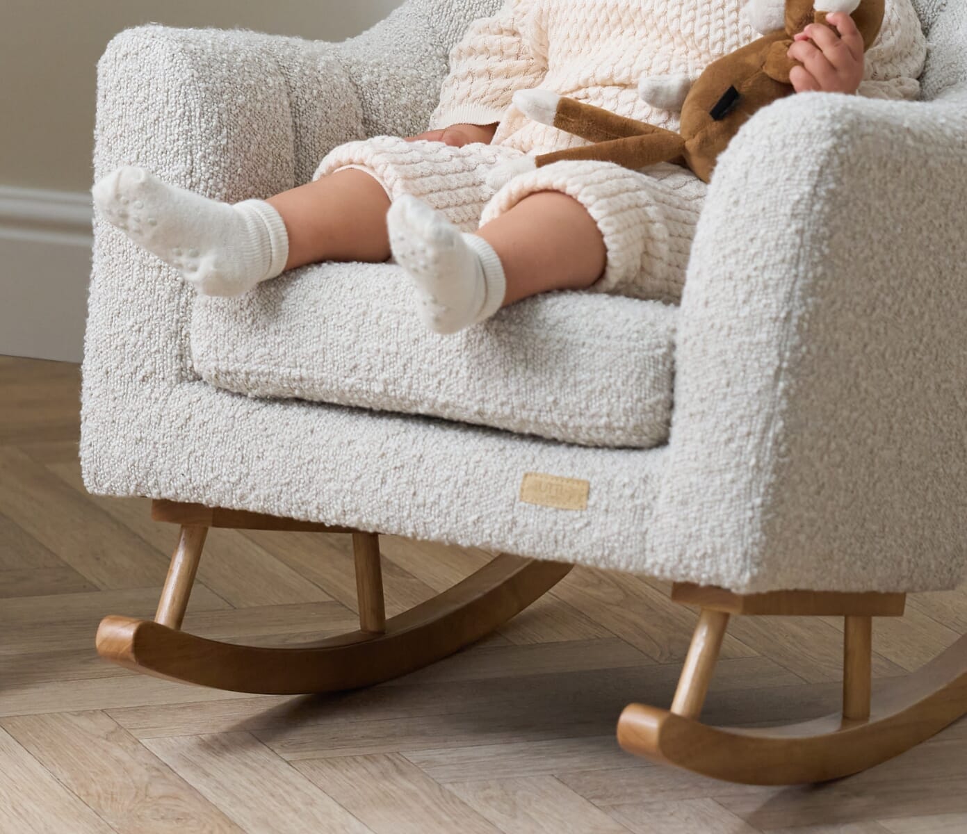 Jonah Mini Me Children's Rocking Chair in Boucle Mushroom - lifestyle image 2 featuring a closeup of the mini rocking chair and the boucle fabric
