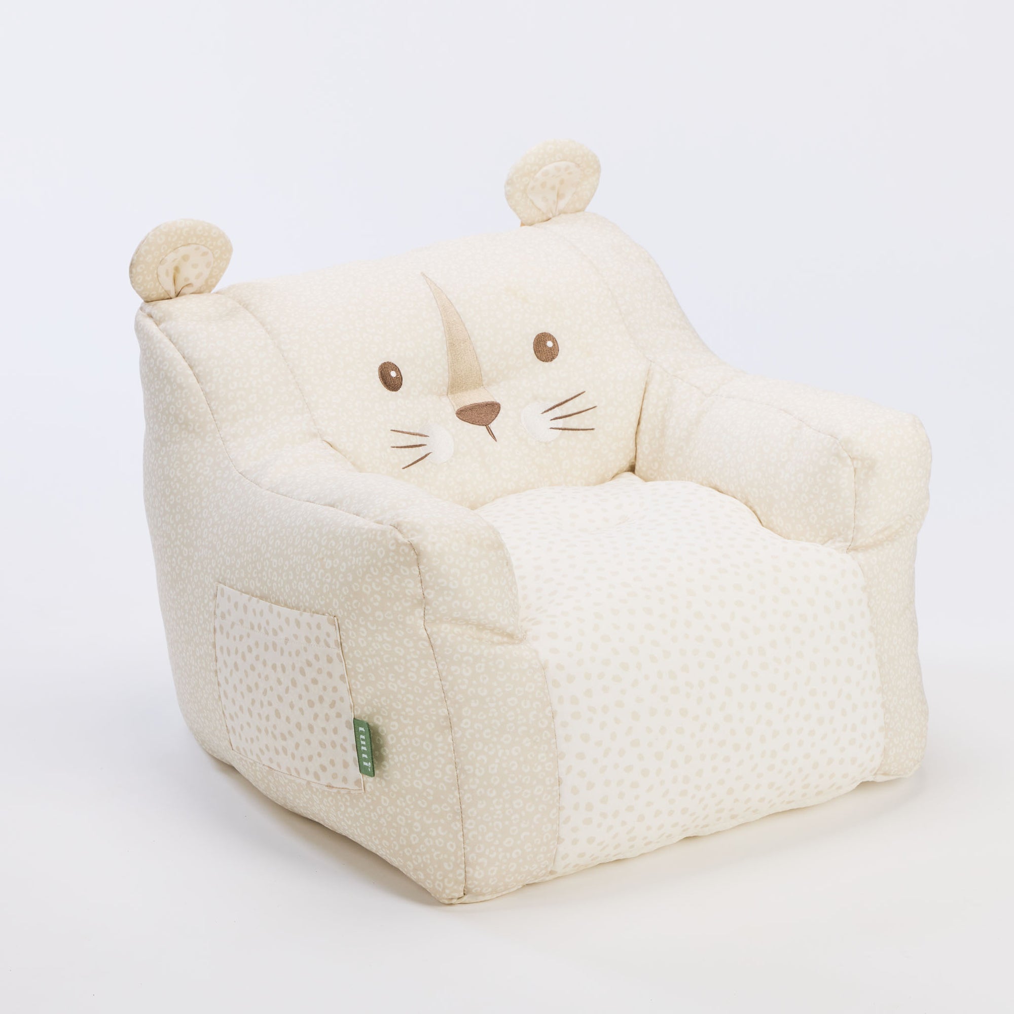 Angled cutout of the Luca Leopard beanbag chair in soft cream fabric with leopard print, showing tufted seat and embroidered whiskers