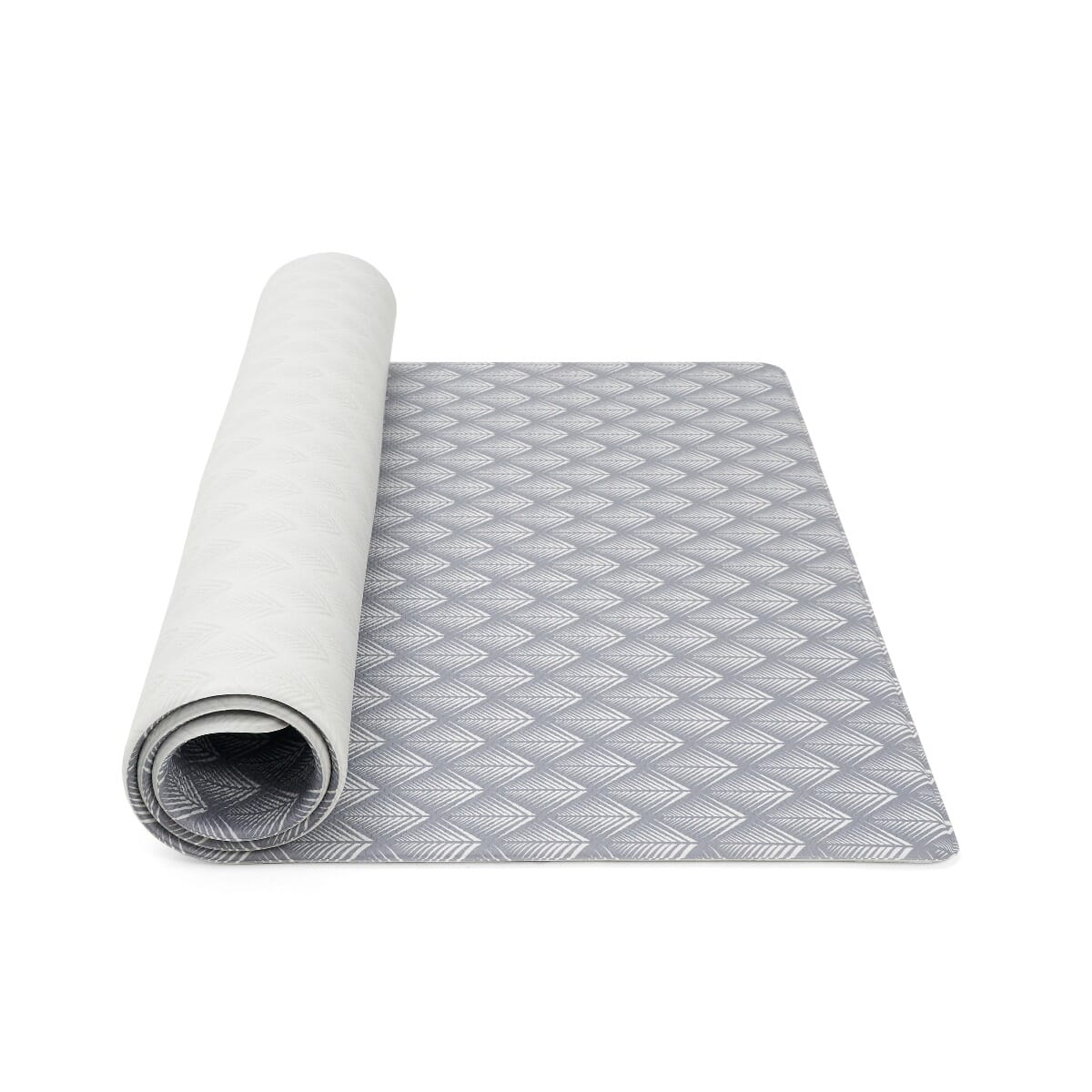 Partially rolled grey fan-pattern play mat showing reversible design and cushioned texture for a soft, supportive surface