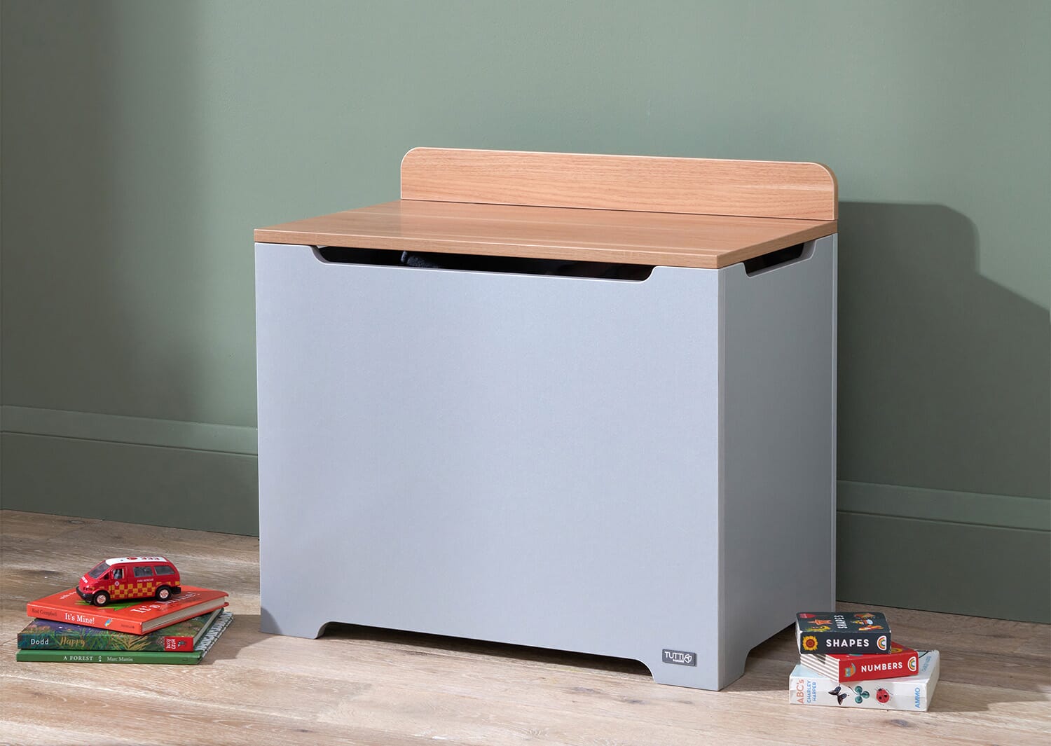 Modena toy box in dove grey and oak styled in a modern nursery, offering a spacious, easy-access storage solution for toys and books