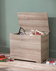 Modena Toy Box Oak styled in a modern nursery room, combining functional toy storage with a clean and natural wood-look aesthetic