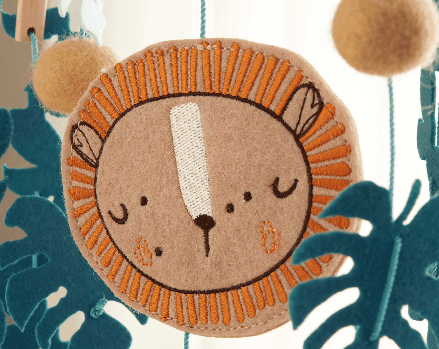 close up of animal detail from the run wild decor bundle showing creative stitching and playful design