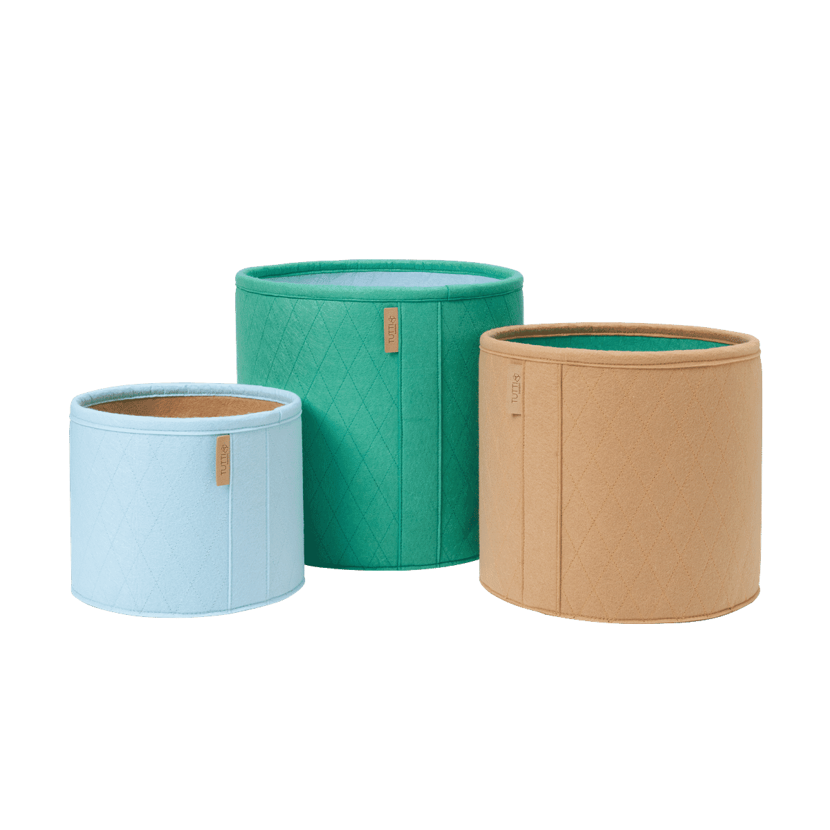 Cutout view of Run Wild storage baskets in coordinating colours, showing cylindrical shape and quilted texture for toy and blanket storage