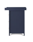 Side view of the Tivoli chest changer in navy, highlighting the integrated changing top and sturdy, space-efficient design