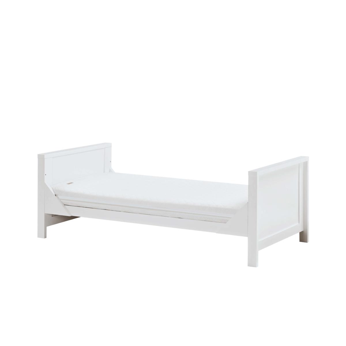 Angled view of the Tivoli cot bed in white converted into a toddler bed, showing low-level design for safe, independent sleep
